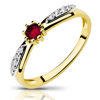 Gold ring with ruby and zircons